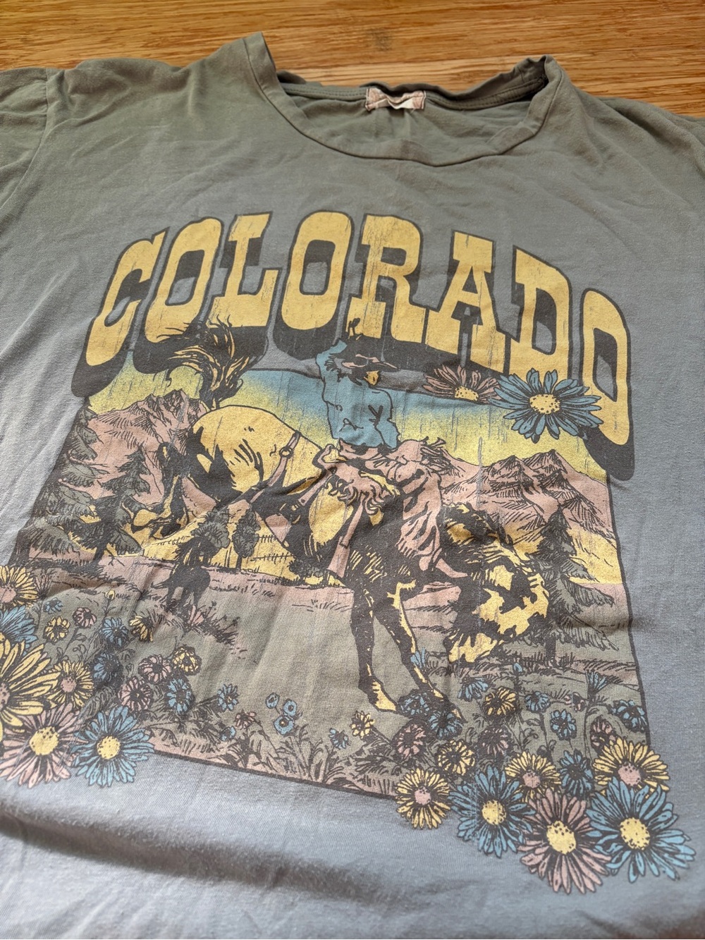 Altar’d State COLORADO Cowboy T-shirt in light green. Size Medium.